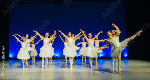 Ballet dancers perform a scene from a classical holiday ballet