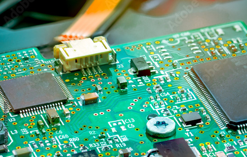 Obraz na plátne Electronic circuit board with integrated microchips and components