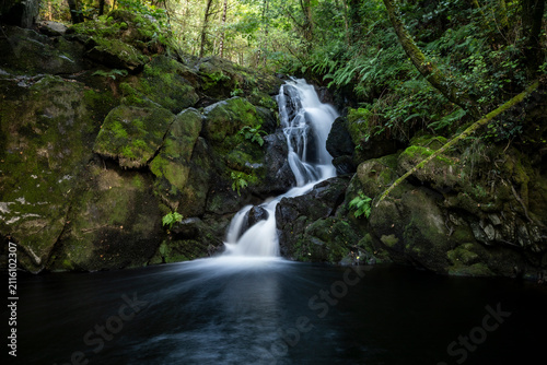Fotografie Idyllic waterfalls on the River Edo in Castro Caldelas, Ourense, Galicia, Spain