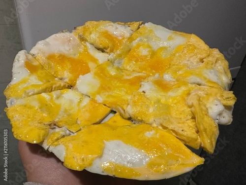 yellow Scrambled eggs on a plate