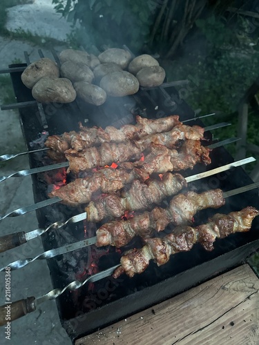 coal roasted potatoes and juicy pork skewer