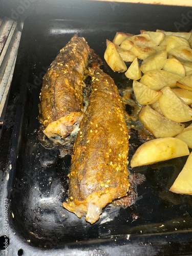 Oven baked fish with potatoes