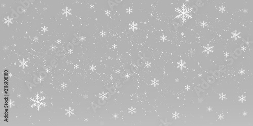 Quadro su tela Falling white snowflakes with tiny snow particles, winter frost and festive Chri