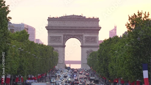 Cinematic footage of the iconic Arc de Triomphe viewed from the Avenue des Champs-Élysées in Paris, France. 4 k video