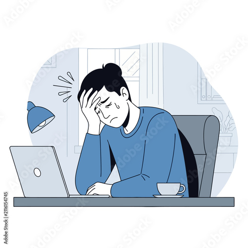 Overwhelmed Man Feeling Stressed While Working Late At His Desk