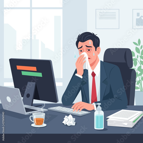 Ill Business Professional Suffering From Cold While Working At His Office Desk