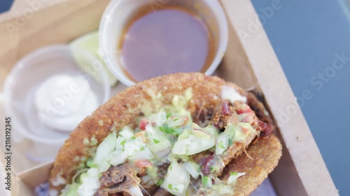 Close-up of Mexican taco with shredded beef and beans
