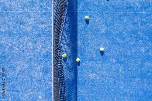 Aerial view of padel balls on a blue court The Concept of sports competition
