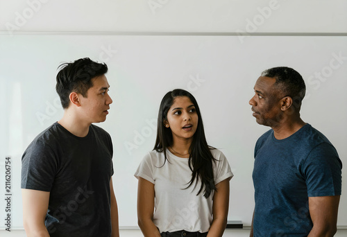 Diverse group of three peop...