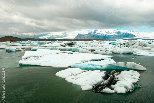 Floating icebergs in Jökulsárlón Glacier Lagoon Iceland with Vatnajökull glacier turquoise waters and breathtaking Arctic landscape