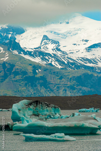 Floating icebergs in Jökulsárlón Glacier Lagoon Iceland with Vatnajökull glacier turquoise waters and breathtaking Arctic landscape