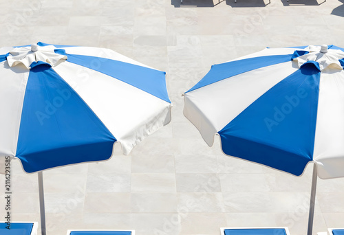 Two blue and white striped ...