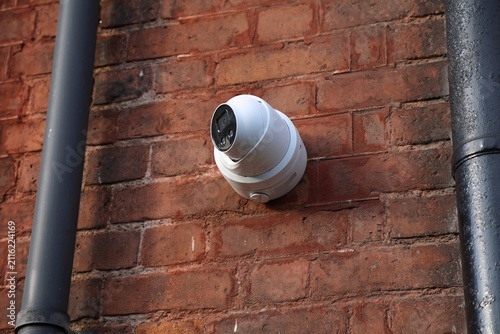 Photography Security surveillance CCTV camera at a building door in Dublin city, Ireland