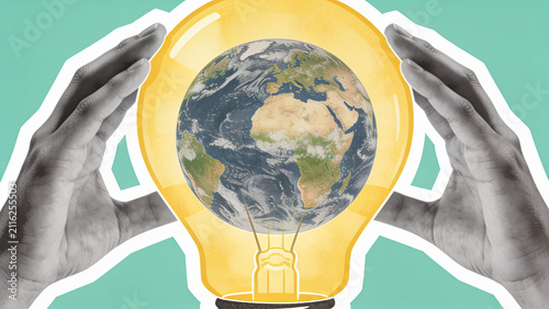 Hands protecting a light bulb with planet Earth inside for sustainability