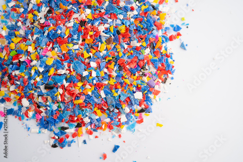 Obraz na płótnie Plastic colorful pieces recycling shredded for industrial use.