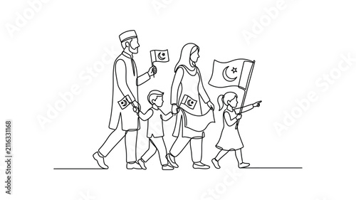 Fotografie Family holding Pakistani flag walking together.