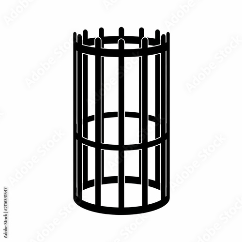 Black cylindrical cage structure made of metal bars forming a protective barrier for gardening and forest conservation purposes to keep animals away from young saplings in a rural outdoor setting