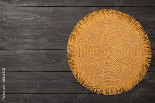 Kitchen napkin on wooden background, top view