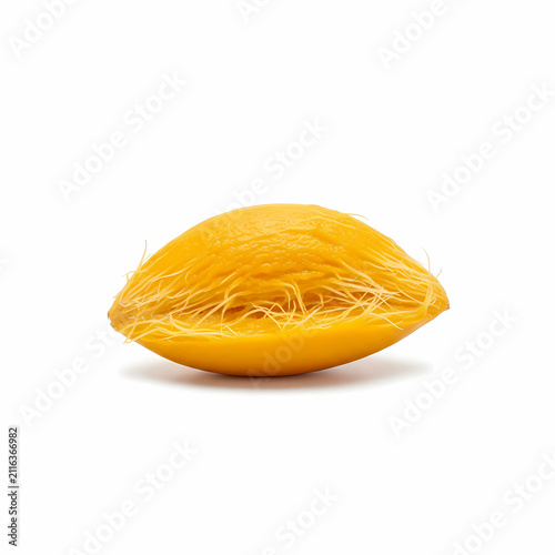 Fresh Yellow Tropical Mango Seed Fibrous Husk Harvested From Ripe Fruit For Cultivation Or Agriculture Purposes Displayed To Showcase The Natural Organic Texture Found Inside The Nut During