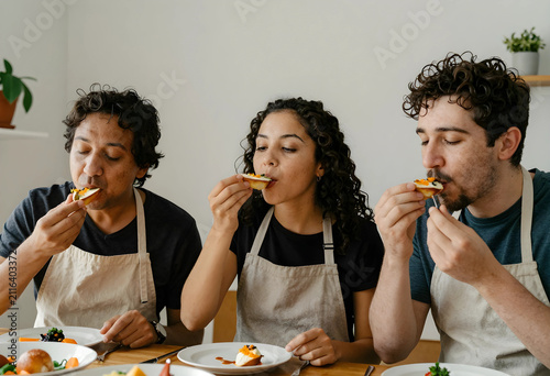 Three diverse adults in apr...