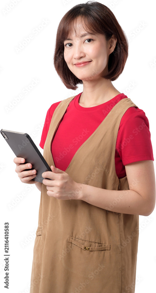 Obraz premium Happy asian woman smiles cheerfully, holding digital tablet. Young adult female expresses confidence, wearing red shirt