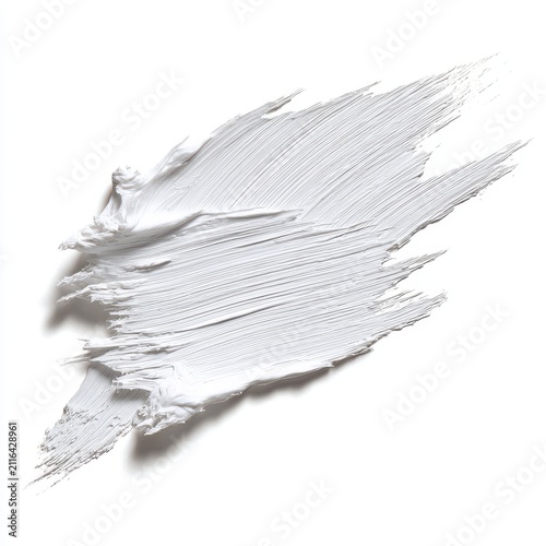 White paint stroke spreading across a white background studio shot close up minimalist style for artistic texture
