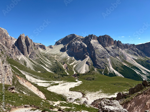 scenic view of the wonderful Dolomite peaks in summer between rocks and valleys