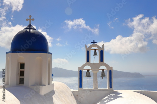 Orthodox Church with its multitiered bell tower facade in Santorini, Greece.