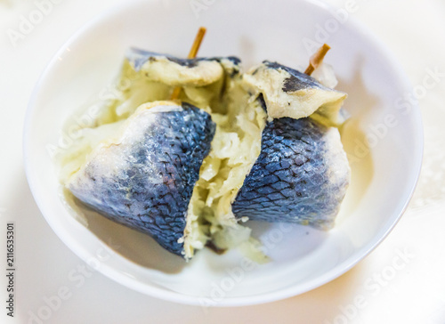 Картината върху платно Traditional Central European pickled herring rolls Zavinace rollmops served in a