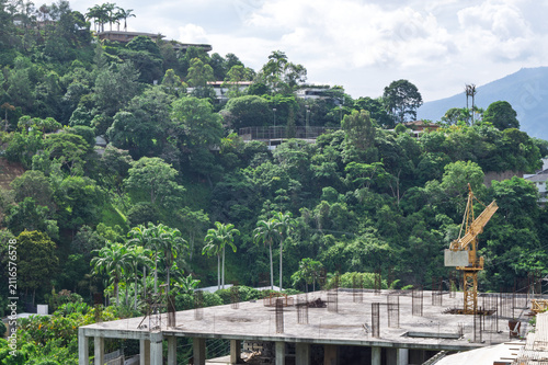  Urban development and construction work in a tropical mountain landscape