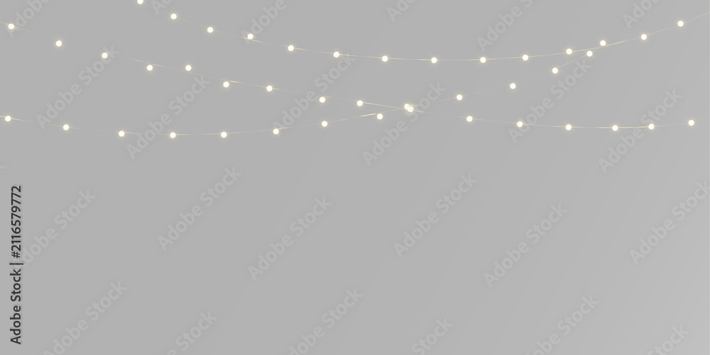 Obraz premium Glowing garland with warm yellow lights, tiny golden bulbs and elegant hanging Christmas strings