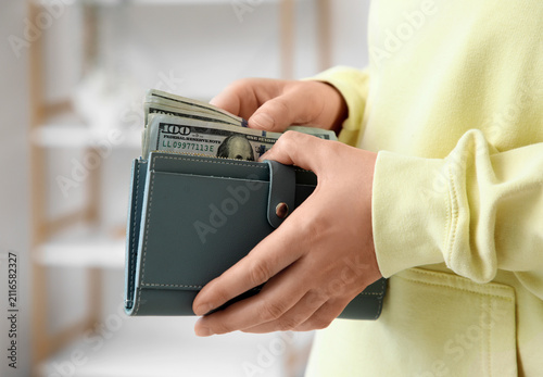 Person holding a wallet ful...