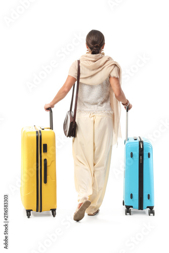 Woman walking away with two...