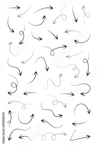 Collection of hand drawn arrows and swirls on a white background directional indicators