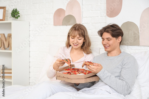 Beautiful young couple hold...