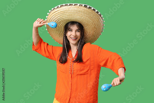 Young woman with sombrero a...