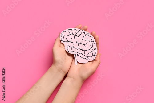 Female hands with paper hum...