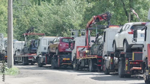 Tow Trucks Transporting Illegally Parked Vehicles