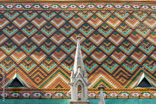 Фотография Close-up diamond pattern of glazed colorful Zsolnay ceramic roof tiles covering
