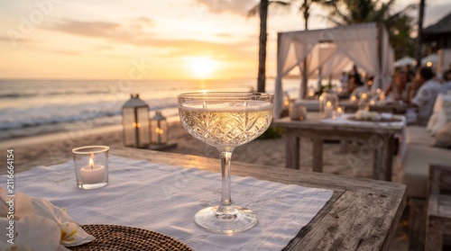Champagne Glass at Luxury Beach Club During Sunset Celebration