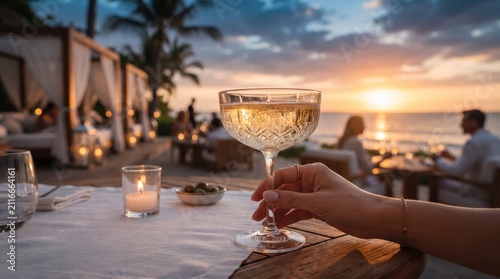Champagne Glass at Luxury Beach Club During Sunset Celebration