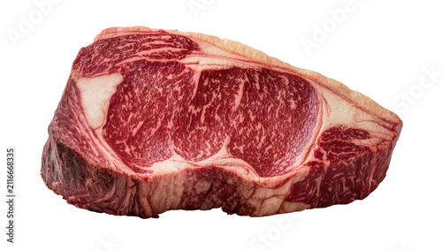 Fotografie Isolated raw premium cut of beef ribeye steak, rich marbling, ready for gourmet