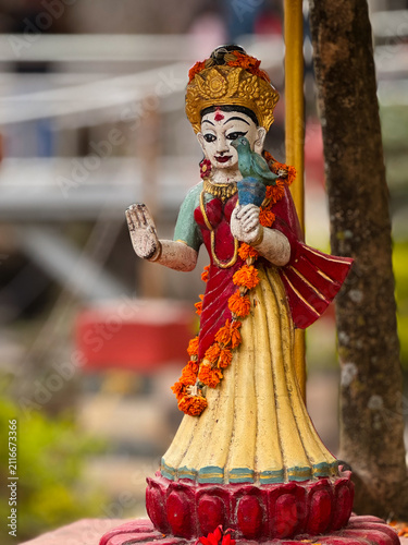 Obraz na płótnie Tulsi Maharani, a deity venerated in Hinduism, on a red lotus-shaped base