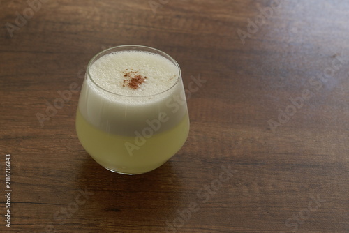 Traditional Peruvian Pisco Sour cocktails served in glasses
