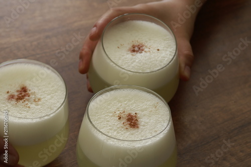 Traditional Peruvian Pisco Sour cocktails served in glasses