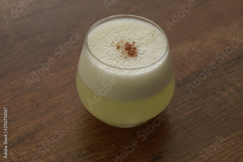 Traditional Peruvian Pisco Sour cocktails served in glasses