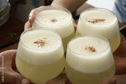 Traditional Peruvian Pisco Sour cocktails served in glasses