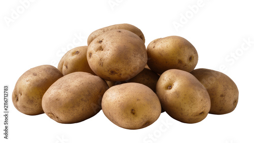 Isolated pile of fresh unpeeled raw potatoes ready for cooking or storage food ingredient