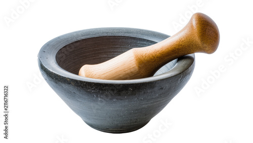 Fotografía Isolated traditional dark stone mortar with a wooden pestle for crushing spices