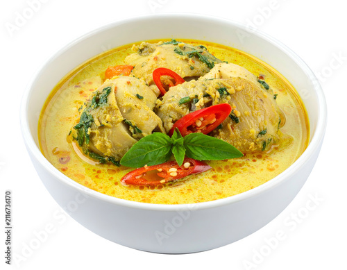 Thai Green Chicken Curry with Basil Leaves and Chili in a White Bowl